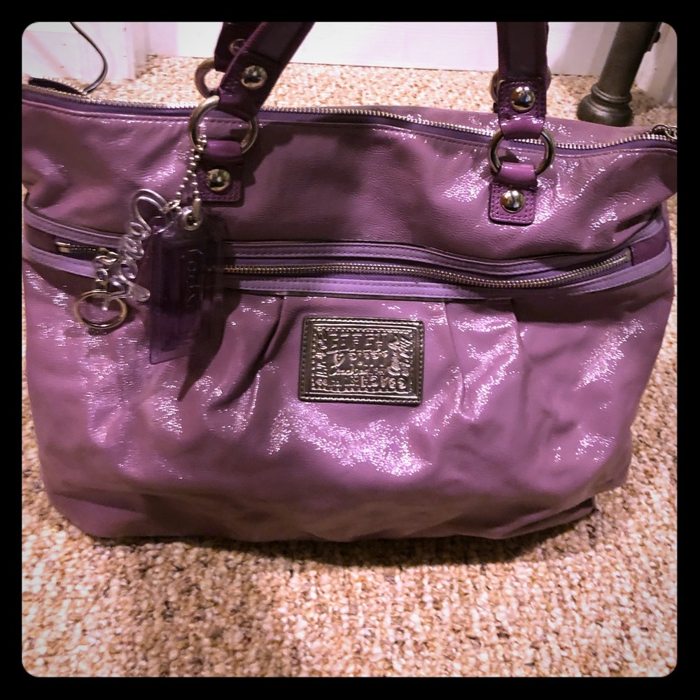 Lavender Coach tote bag.